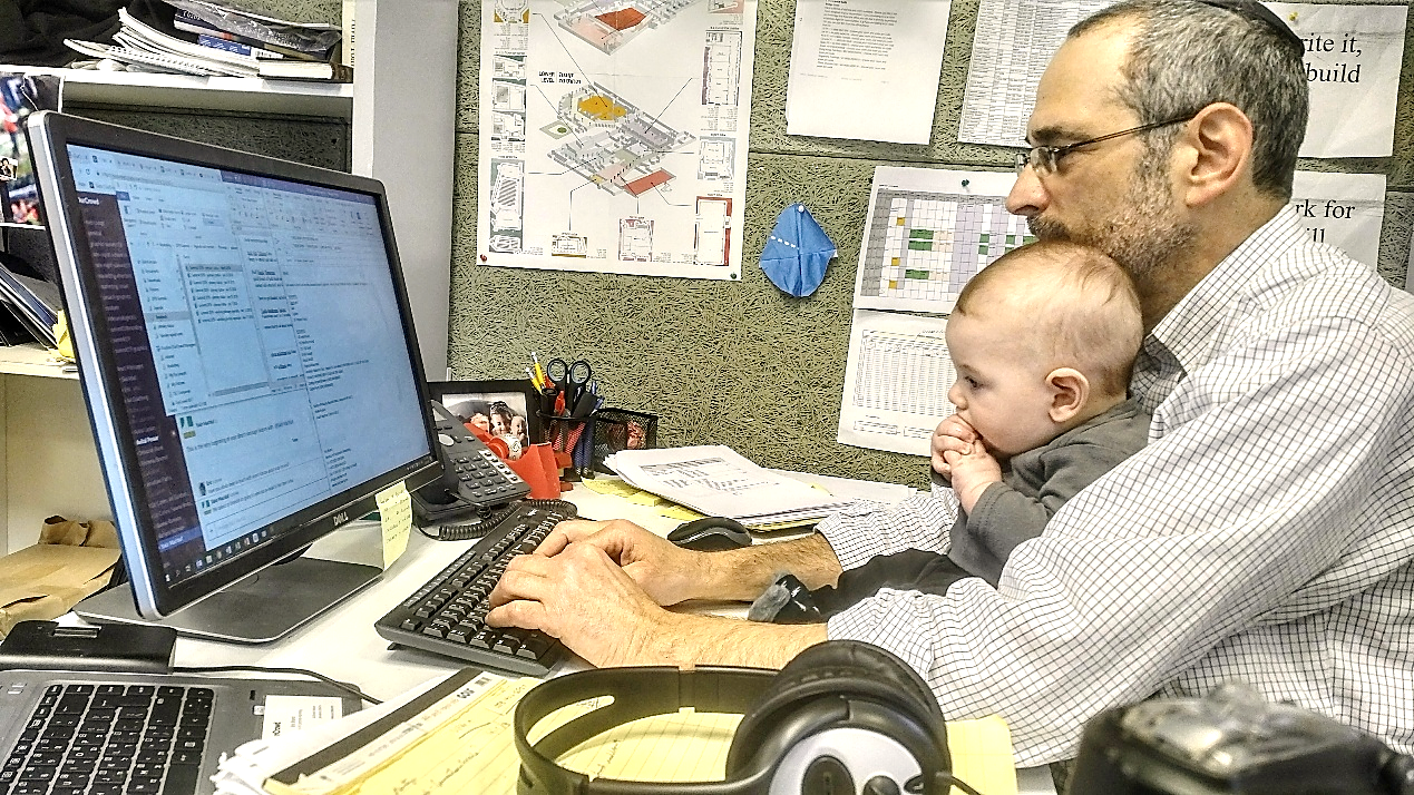 Eric Brand working at his desk